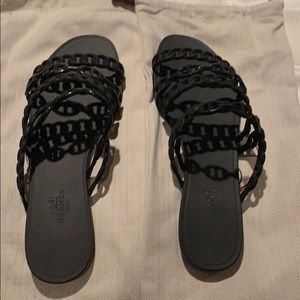 Brand new never worn black rubber Hermes slides.